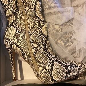 Faux snake skin high heeled boots